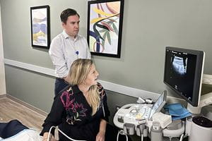 Drs. Erin Forster and Stephen Fuller performing IUS