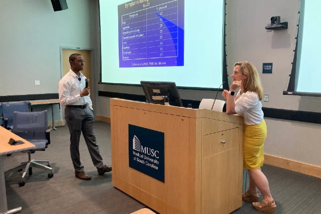 Dr. Brandon Washington giving lecture for HPMF didactic 