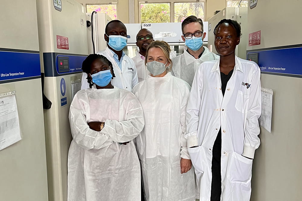 Samuel Kennedy and April Borkman with key lab team members at the Integrated Biorepository of H3Africa at Makerere University in Kampala, Uganda.