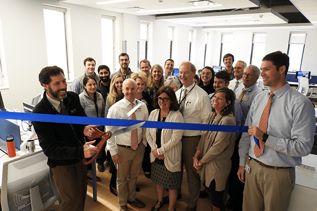 Don Rockey, M.D., chairman of the Department of Medicine; faculty members; and staff joined together in a ribbon-cutting ceremony to open the new resident space