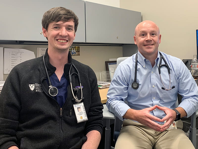 Marc Heincelman, M.D., (right) and Patrick Strickland, M.D., (left) a PGY2 internal medicine resident who was the senior resident on the General Internal Medicine COVID-19 rule-out service.