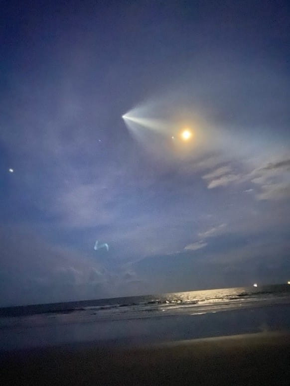 Inspiration4 mission rocket photographed travelling over Folly Beach.