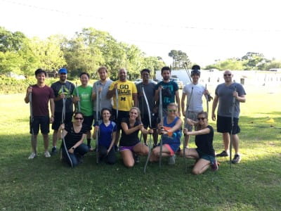 group picture of residents doing archery
