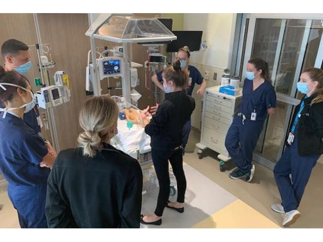 Neonatology Fellows participating in Simulation Lab activities