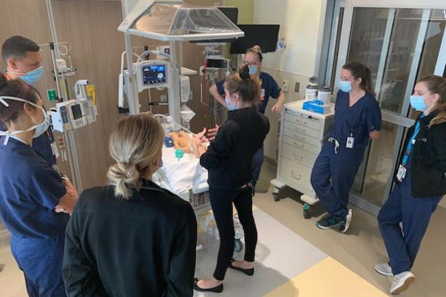 Neonatology Fellows participating in Simulation Lab activities