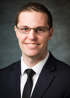 Headshot of Dr. Alexander Hutchinson