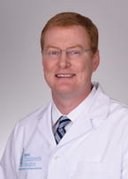 Headshot of Dr. John Costello