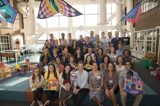 Fun group photo of our current Categorical Pediatric Residents in our Children's Hospital Atrium