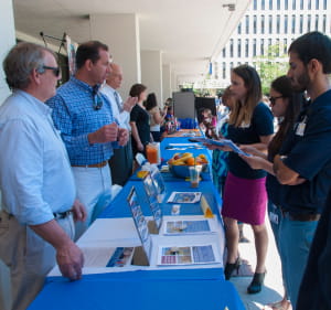 MPH students talk to people at public health week booths