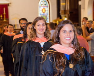 Happy graduates leave their M.P.H. Hooding ceremony