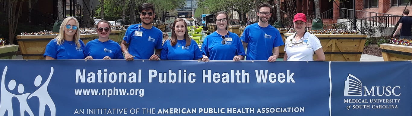 M.P.H. students holding National Public health week banner
