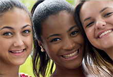 Image of three smiling girls