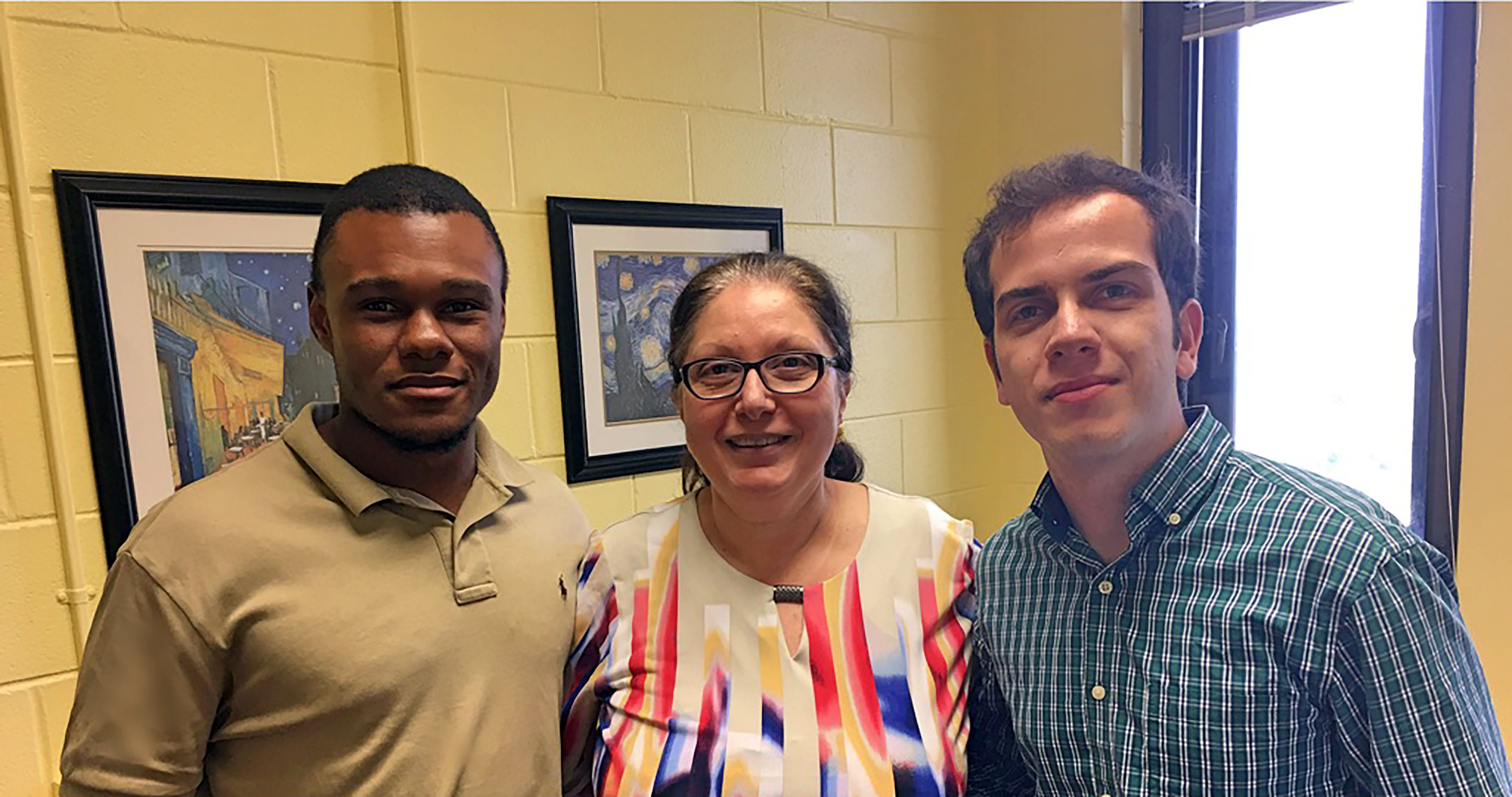 Dr. Hammad and student Jonathan Low from Anderson University, Greenville, left, and visiting MD student Faris Matanis from Jordan University of Science and Technology, Jordan