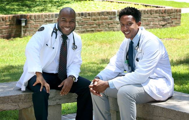 photo of two male medical students on campus