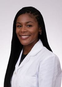 headshot of Kiara Myers in white coat