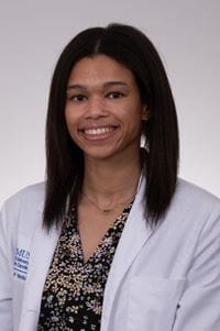 headshot of Brianna Robinson in white coat