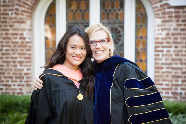 Master of Public Health student poses with professor